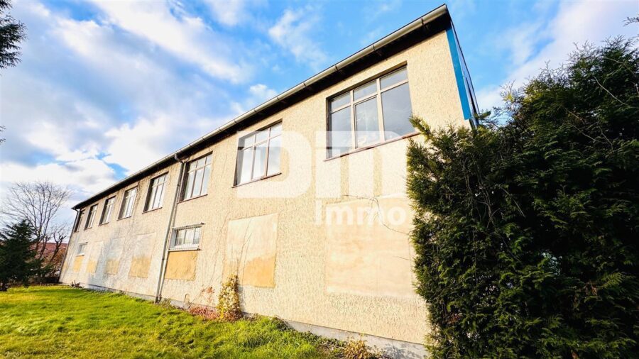 Modernisierter Gewerbekomplex (2 Gebäudeteile) mit langfristigem Mieter + freie Flächen im OG - Seitenansicht